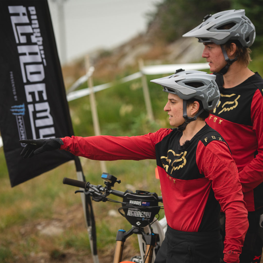 Flo and Bradley checking the next challenge on Flo riding on Episode 7 of Pink Bike Academy Season 2